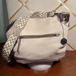 The Sak Cream Leather adjustable crossbody Bag